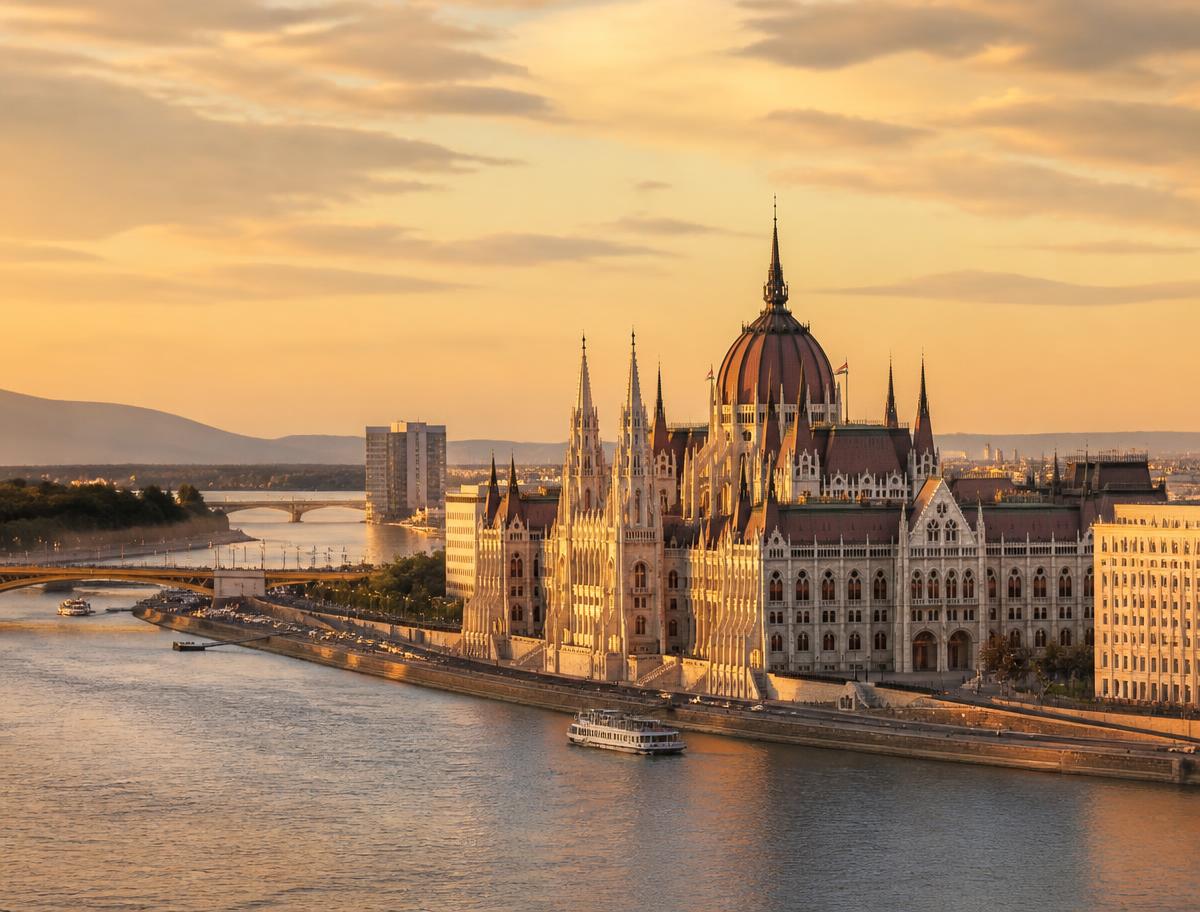 The Hungarian Parliament building along the Danube in Budapest at golden hour